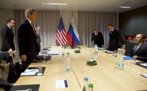 Thomson Reuters : US Secretary of State John Kerry takes his seat across the table from Russian Foreign Minister Sergey Lavrov.