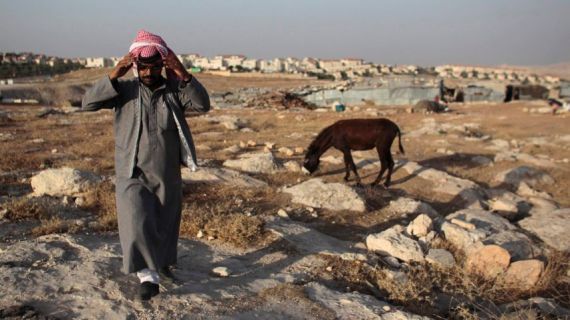 A Bedouin of the Jahalin tribe walks in his encampment near the Jewish settlement of Maale Adumim, east of Jerusalem, June 16, 2012.Reuters read more: http://www.haaretz.com/opinion/.premium-1.723737